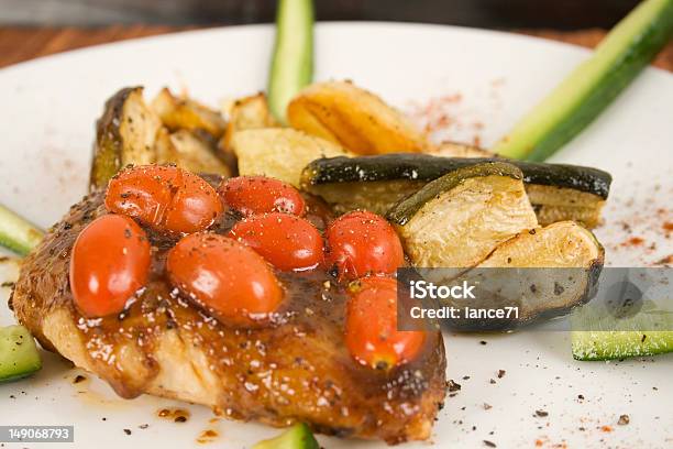 Cooked Chicken Fillet Arrangement Stock Photo - Download Image Now - Cherry Tomato, Chicken Breast, Chicken Meat