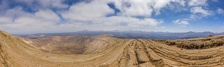 Panoramic view over the volcanic crater of Caldera Blanca on Lanzarote during daytime