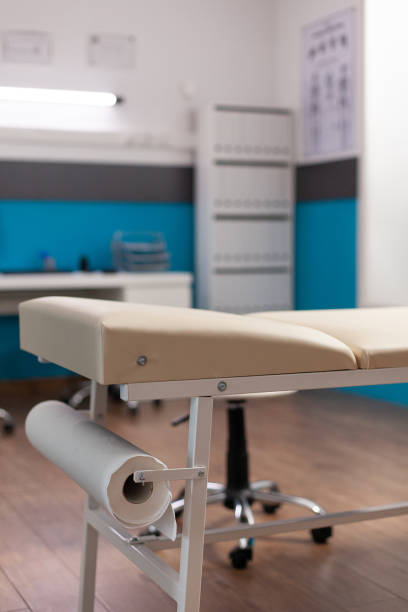 istock Selective focus on medical bed in empty hospital office with nobody in it 1490693851