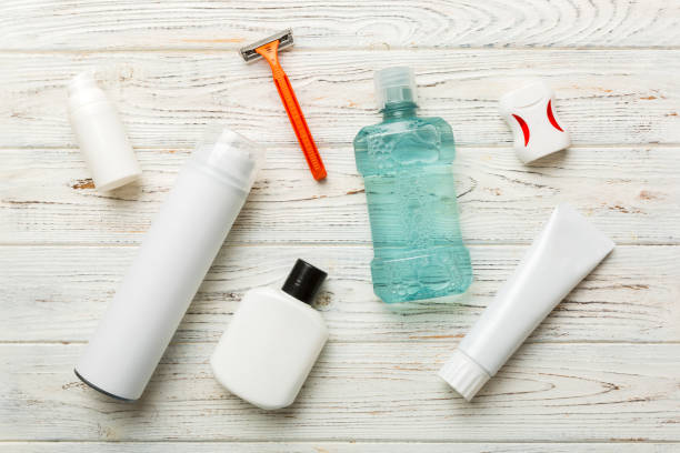 istock Mockup for bathing products top view flat lay, spa razor, toothpaste, soap, gel and other various accessories. Cosmetics for skin health. Bath Mockup for your logo 1490694318