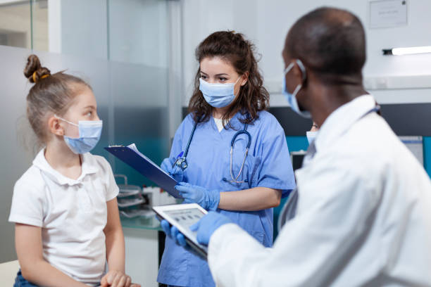 istock African american pediatrician doctor analyzing disease symptoms expertise 1490695697