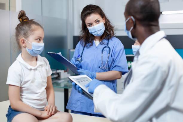 istock African american pediatrician doctor analyzing sickness expertise using tablet 1490696841