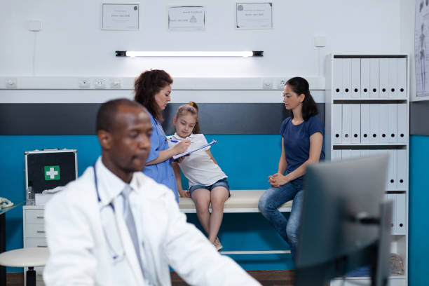 istock African american pediatrician doctor typing diagnostic expertise on computer 1490697603