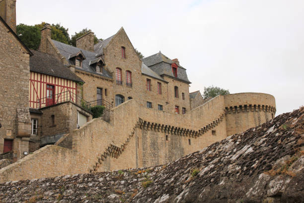 istock Houses and medieval wall in Le Mont-Saint-Michel 1490698113