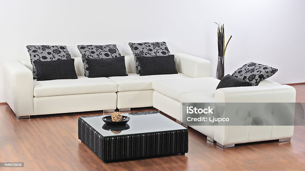 Modern minimalist living-room A modern minimalist living-room with furniture Apartment Stock Photo