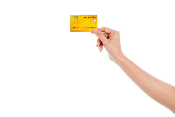 istock Hand holding credit card isolated on white background with clipping path. 1490707700