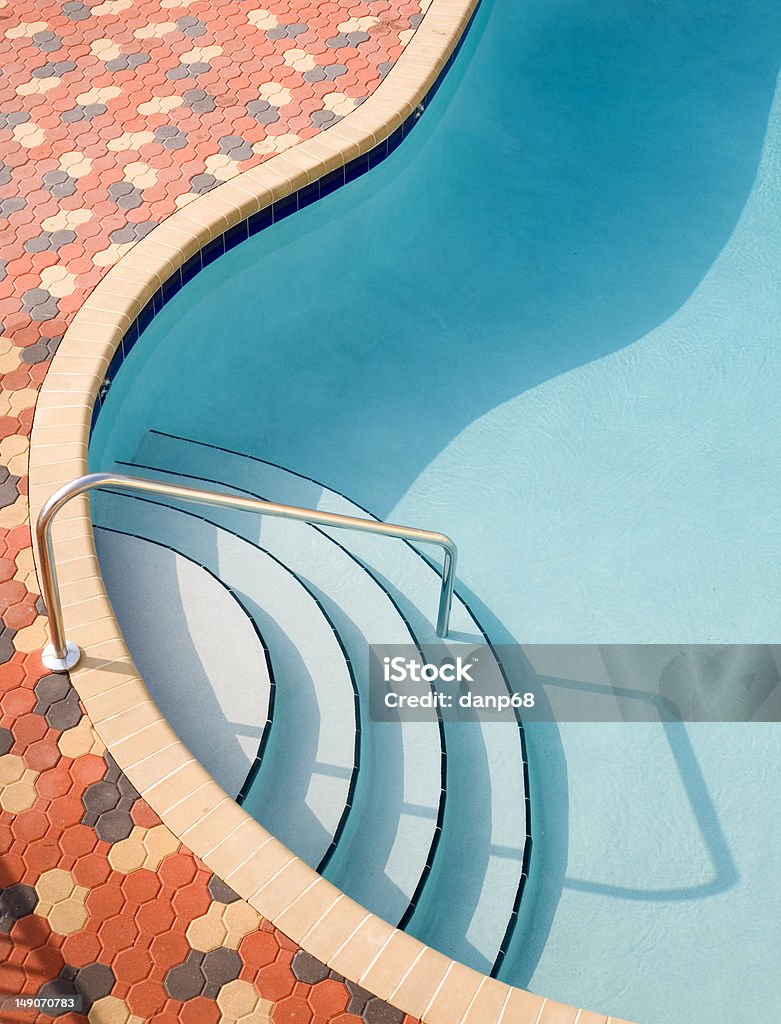 Resort Swimming Pool Beautiful swimming pool and deck composition. Swimming Pool Stock Photo