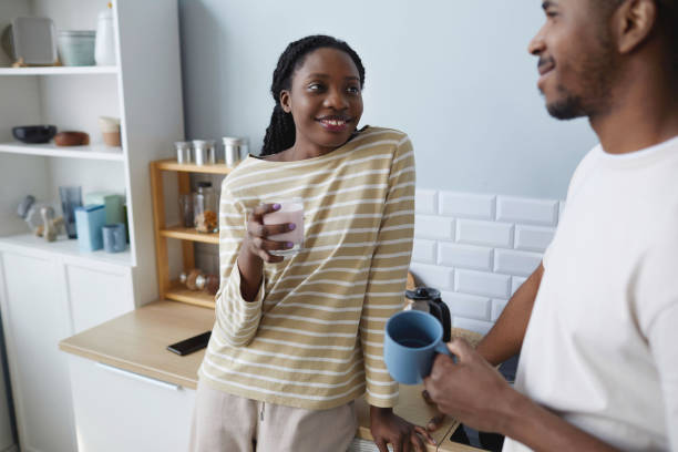 istock Young couple drinking coffee in the morning 1490709524