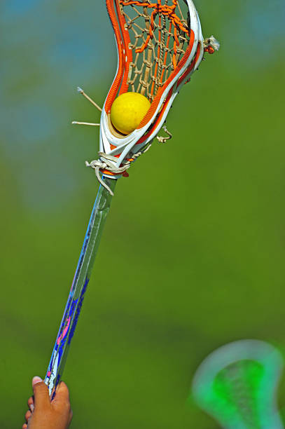 istock Girls lacrosse stick with ball 149070979