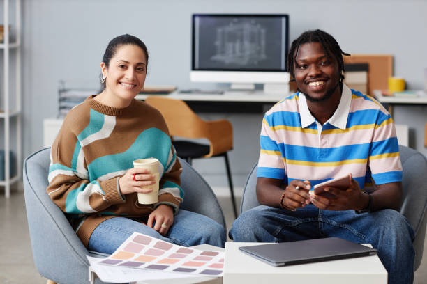 istock Couple of designers working in team in office 1490710206