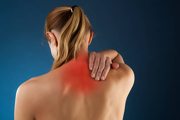 istock Woman massaging pain back 149071059