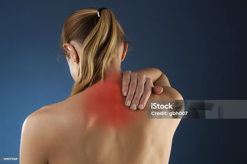 Woman massaging pain back Woman massaging pain back  Adult Stock Photo