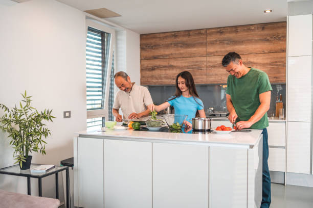 istock Multigenerational Asian Family Members Cooking At Home 1490711226