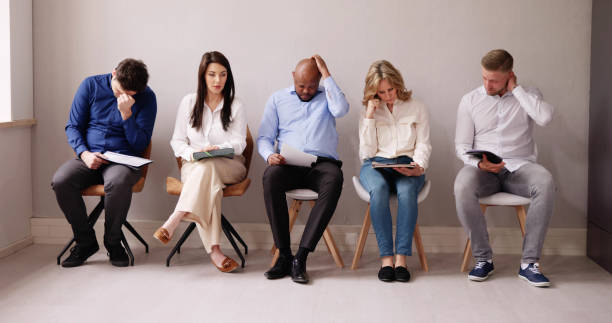 istock People Bored While Sitting On Chair Waiting For Job Interview 1490711382