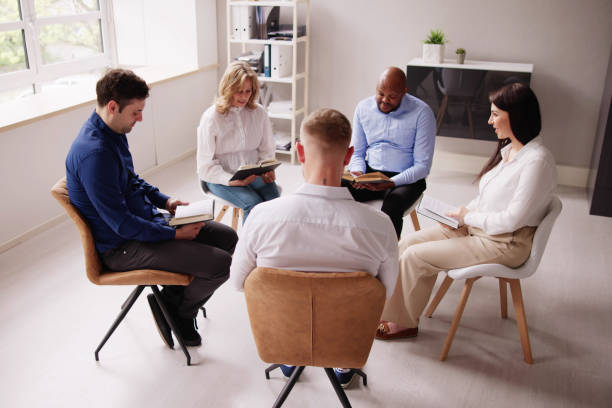 istock Group Of People Sitting On Chair 1490711415