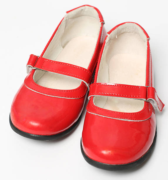 istock Red children's varnished shoes isolated on white background 149071318