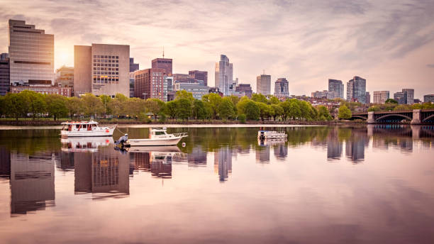 Boston's Skyline Boston, MA, USA - May 12, 2023: The skyline of Boston in Massachusetts, USA showcasing the Longfellow bridge over the Charles river and its mix of contemporary and historic buildings at sunrise. boston prudential building stock pictures, royalty-free photos & images