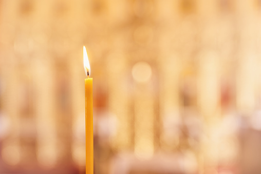 Candles burning in church background. Card with Copy Space for text.