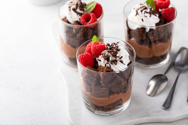istock Chocolate trifle or parfait with chocolate mousse and whipped cream 1490717844
