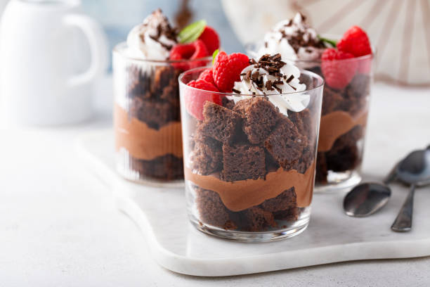 istock Chocolate trifle or parfait with chocolate mousse and whipped cream 1490717845