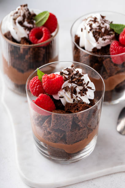 istock Chocolate trifle or parfait with chocolate mousse and whipped cream 1490717847