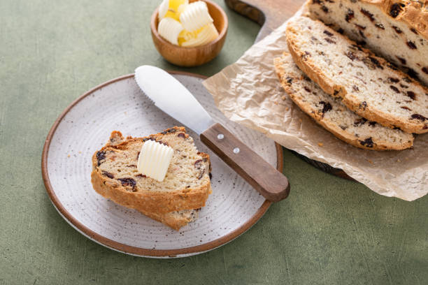 istock Soda bread in a cast iron pan with cranberries and pecans 1490718227
