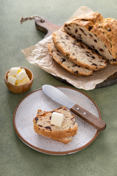 istock Soda bread in a cast iron pan with cranberries and pecans 1490718233