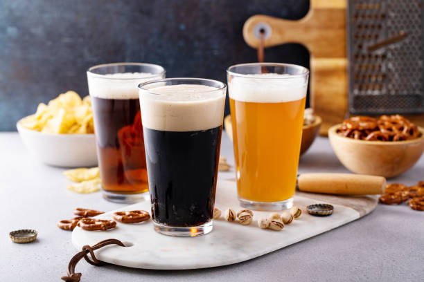 istock Variety of beer with snacks on the table 1490718256