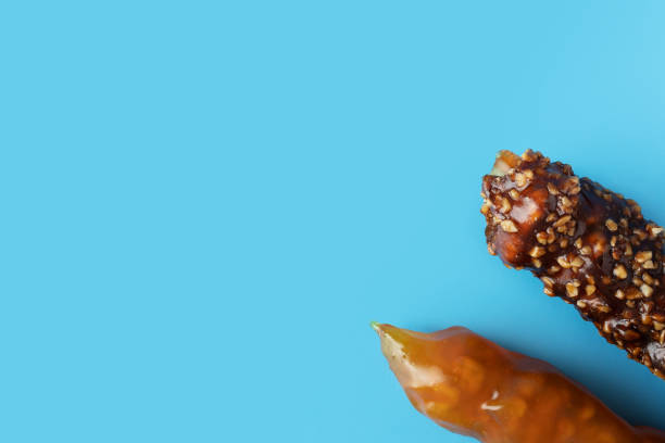 istock churchkhela, Traditional Georgian candy on a blue background, copy space 1490718728