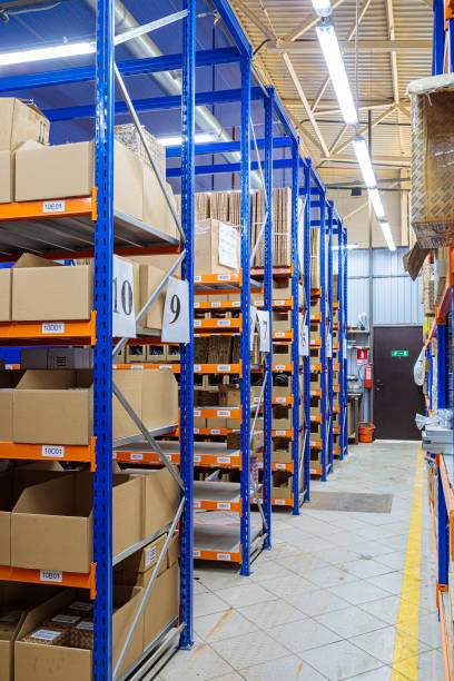istock High racks in the warehouse of goods. 1490721079