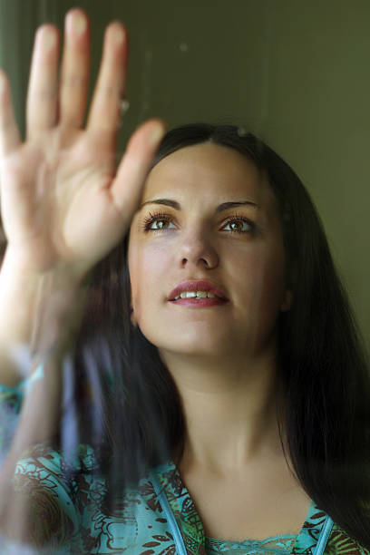 istock The girl behind glass 149072300