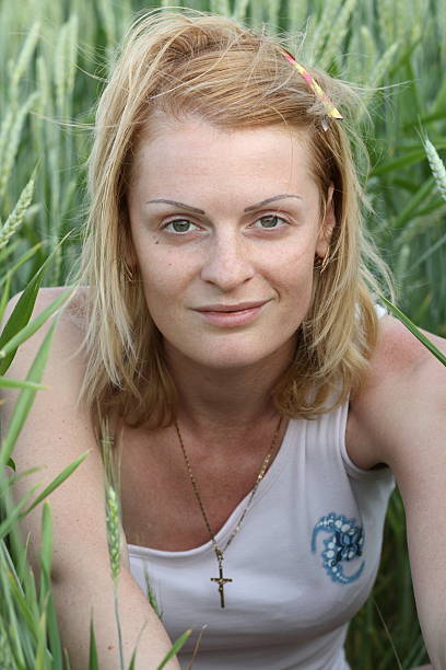 Woman and grain stock photo