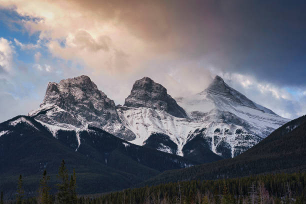 istock Sunrise over Three sisters mountains in Banff national park at Canmore 1490723749