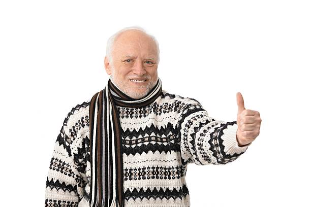 portrait de heureux homme senior avec un pouce levé - men sweater excitement satisfaction photos et images de collection