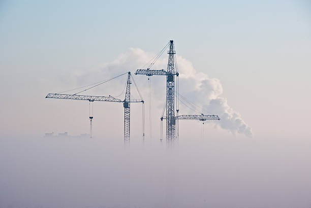 雲のクレーン - industrial equipment industry growth silhouette ストックフォトと画像