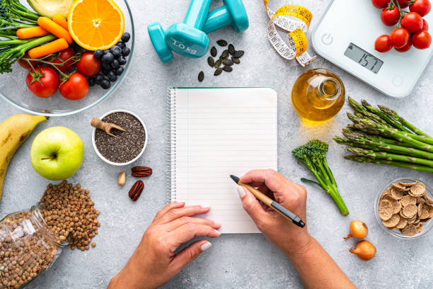 istock Woman planning well balanced diet 1490732289