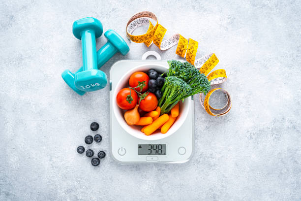 istock Healthy eating, weight control and exercising concept 1490732294