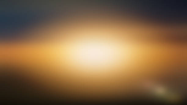 Abstract gradient sunrise in the sky with blue and orange natural background stock photo