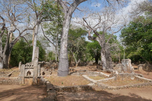 istock Trees growing through the ancient ruins at Gede 1490736437