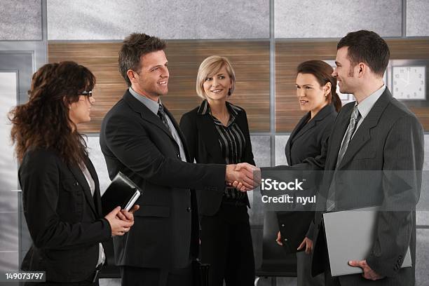 Businesspeople Greeting Each Other Stock Photo - Download Image Now - 20-29 Years, 25-29 Years, 30-39 Years