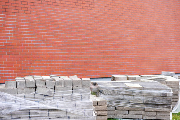 istock A brick wall with a brick wall and a brick wall with a sign that says brick on it. 1490739853