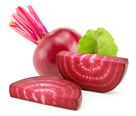 beetroot with slices and green leaves isolated on white background. clipping path
