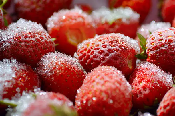 Photo of Large pile of frozen strawberries