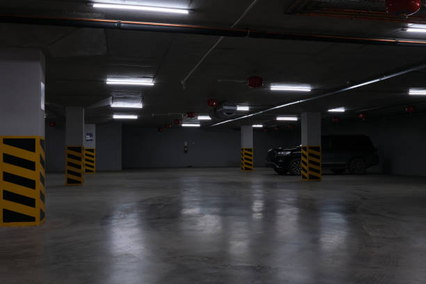istock Interior of an empty underground parking for cars 1490749011