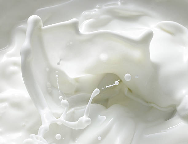 ミルク「スプラッシュ」 - ミルク ストックフォトと画像