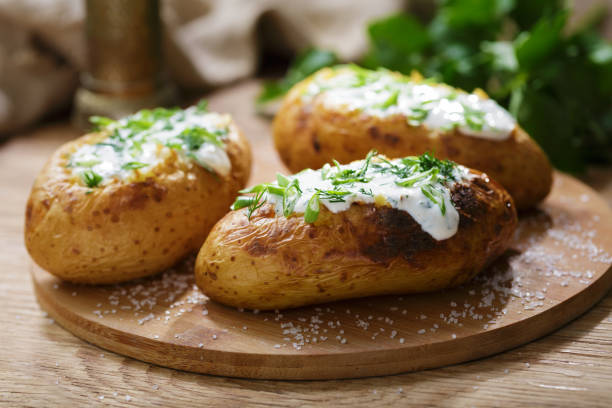 istock Baked potato with cream sauce 1490755551