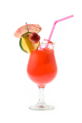 Mai Tai mixed drink with fruit and umbrella garnish on whte background
