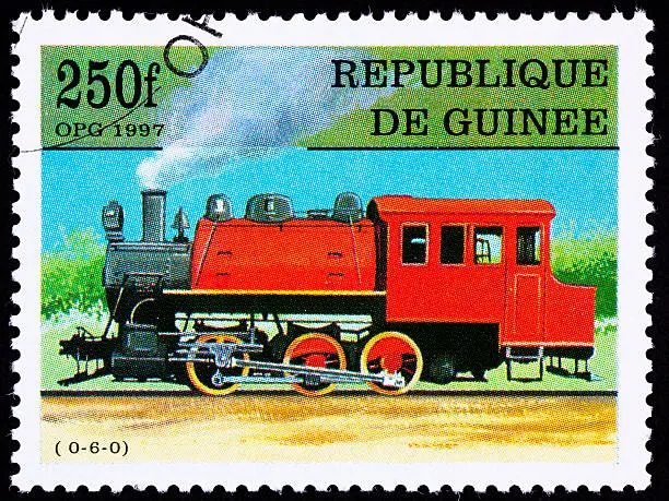 Photo of Canceled Guinea Train Postage Stamp Old Railroad Steam Engine Locomotive