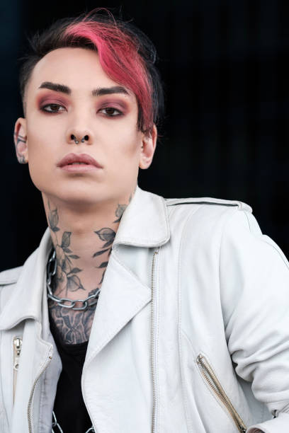 istock Headshot of androgynous non-binary male model looking at camera. 1490764143
