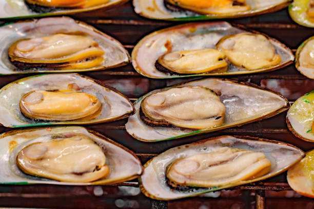 istock Chilean green mussels are fried in open casings, selective focus 1490764243
